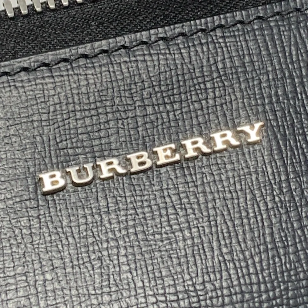 Burberry Embossed Leather Zip Around Leather Envelope Pouch for Men